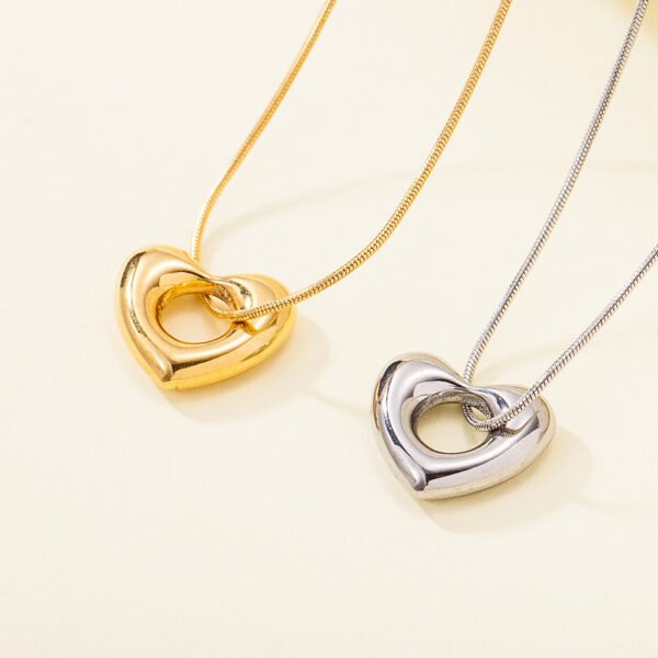 Light luxury stainless steel 18k gold plated color preserving snake bone chain simple waterproof hollow heart titanium steel necklace