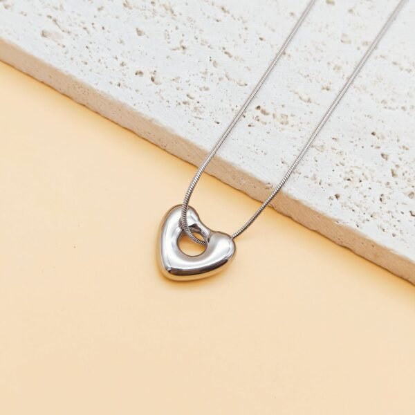 Light luxury stainless steel 18k gold plated color preserving snake bone chain simple waterproof hollow heart titanium steel necklace - Image 8