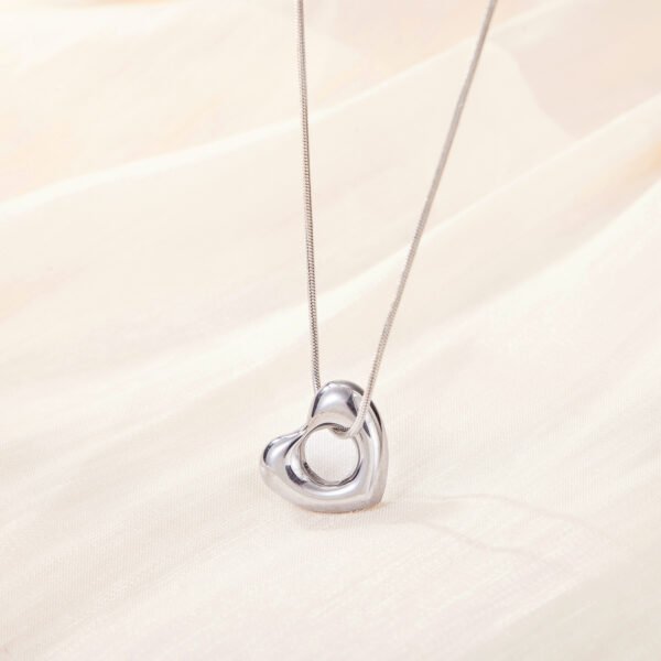 Light luxury stainless steel 18k gold plated color preserving snake bone chain simple waterproof hollow heart titanium steel necklace - Image 6