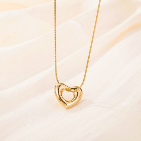 Light luxury stainless steel 18k gold plated color preserving snake bone chain simple waterproof hollow heart titanium steel necklace - Image 3