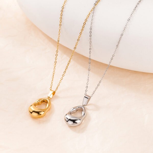 Stainless steel hollow water drop necklace French simple all-match titanium steel clavicle chain light luxury design sense sweater chain women